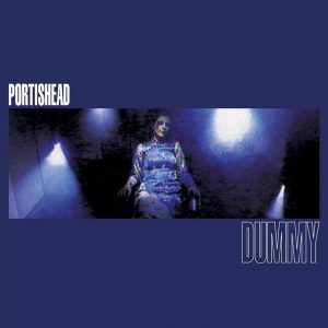 Vinyl cover for Portishead's Dummy—an abstract vibe, shades of muted tones blending together, mysterious yet familiar. It’s like a visual echo of the sound, haunting and beautiful. Perfect for vinyl lovers, or just anyone who appreciates a bit of art in their life.