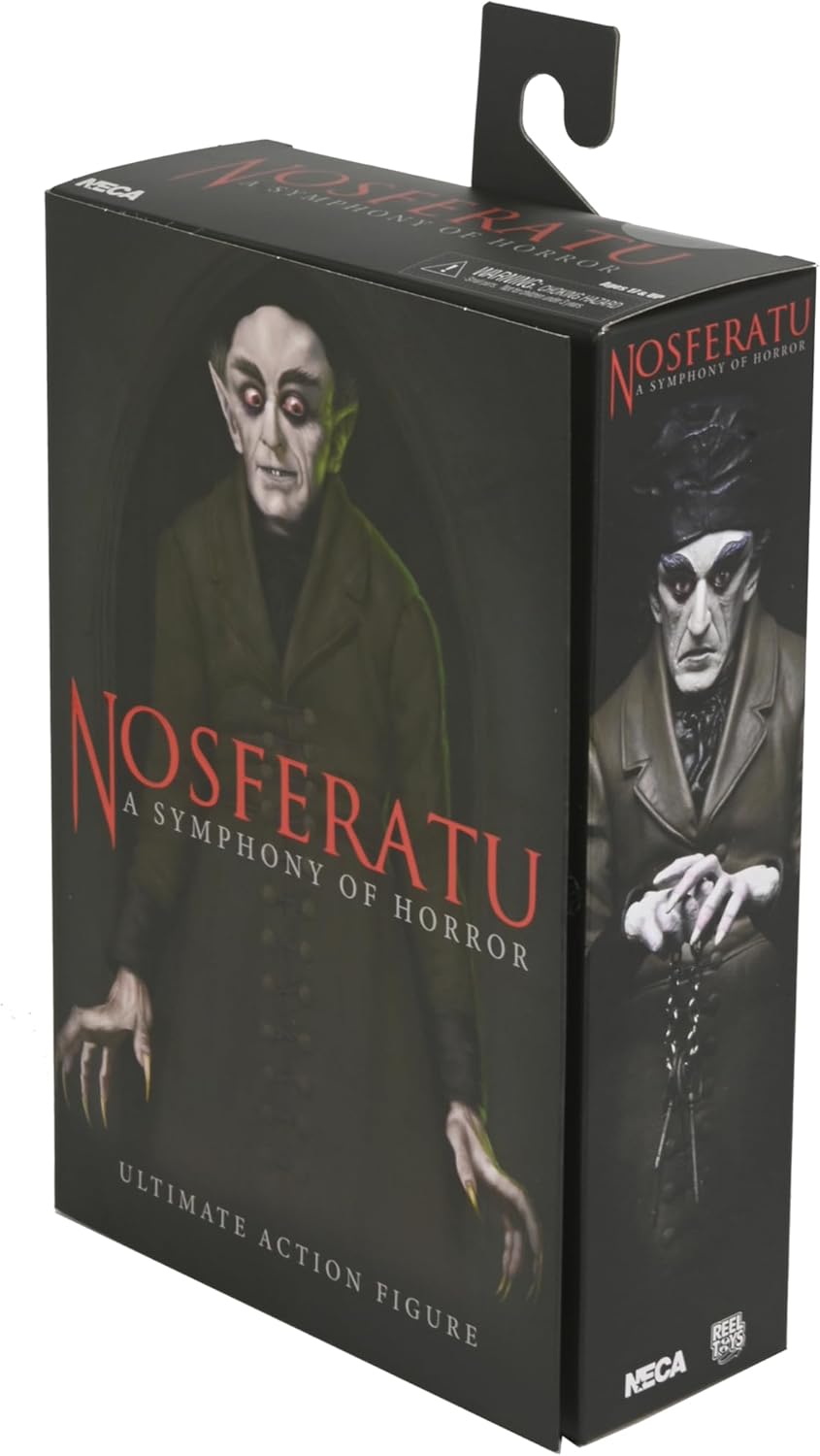 Nosferatu figure strikes a wild pose—check out the crazy details! This little guy comes with cool interchangeable heads, a stylish hat, and even a quill pen. All against a simple backdrop that lets those features pop.