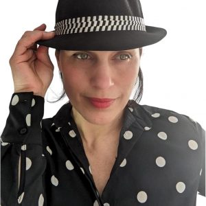 Flat-brimmed ska hat in classic black and white check—perfect for making a statement. Adjustable strap for a comfy fit. What's not to love?