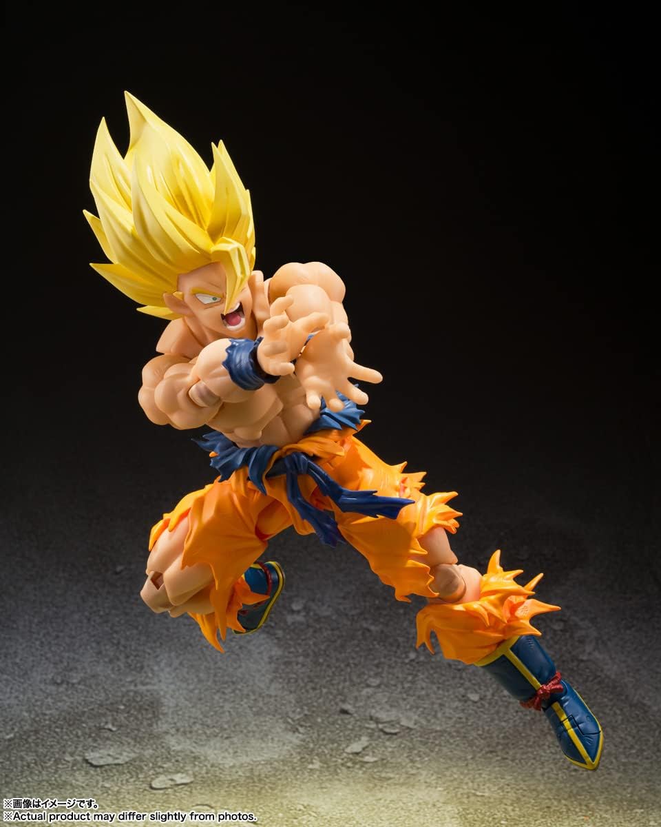Epic Super Saiyan Goku action figure—crazy vibrant yellow hair, blue and orange threads. He’s got that dynamic pose, ready to unleash some serious energy. Just look at that—simple background makes him pop!