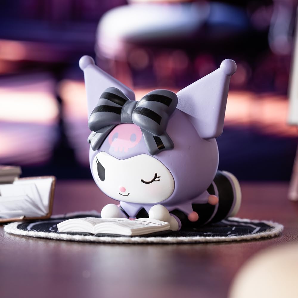 Close-up of the Kuromi Blind Box figure—this cheeky black character grins with a hint of mischief. Bright accessories all around, making it pop with playful energy. Got to love that attitude!