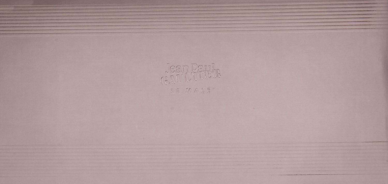 A tiny cat figurine lounging on a rustic wooden base—so much detail crammed into this little piece. The colours pop, and those features? Wildly realistic! Perfect for cat lovers or just anyone who appreciates quirky decor.