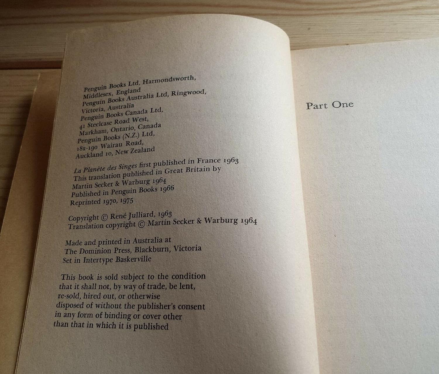 The cover of "Monkey Planet"—bold illustration of a monkey, wild and untamed, set against a lush jungle backdrop. It's striking, kinda chaotic, with the thick green vines wrapping around. You can almost hear the distant calls of other creatures, right?