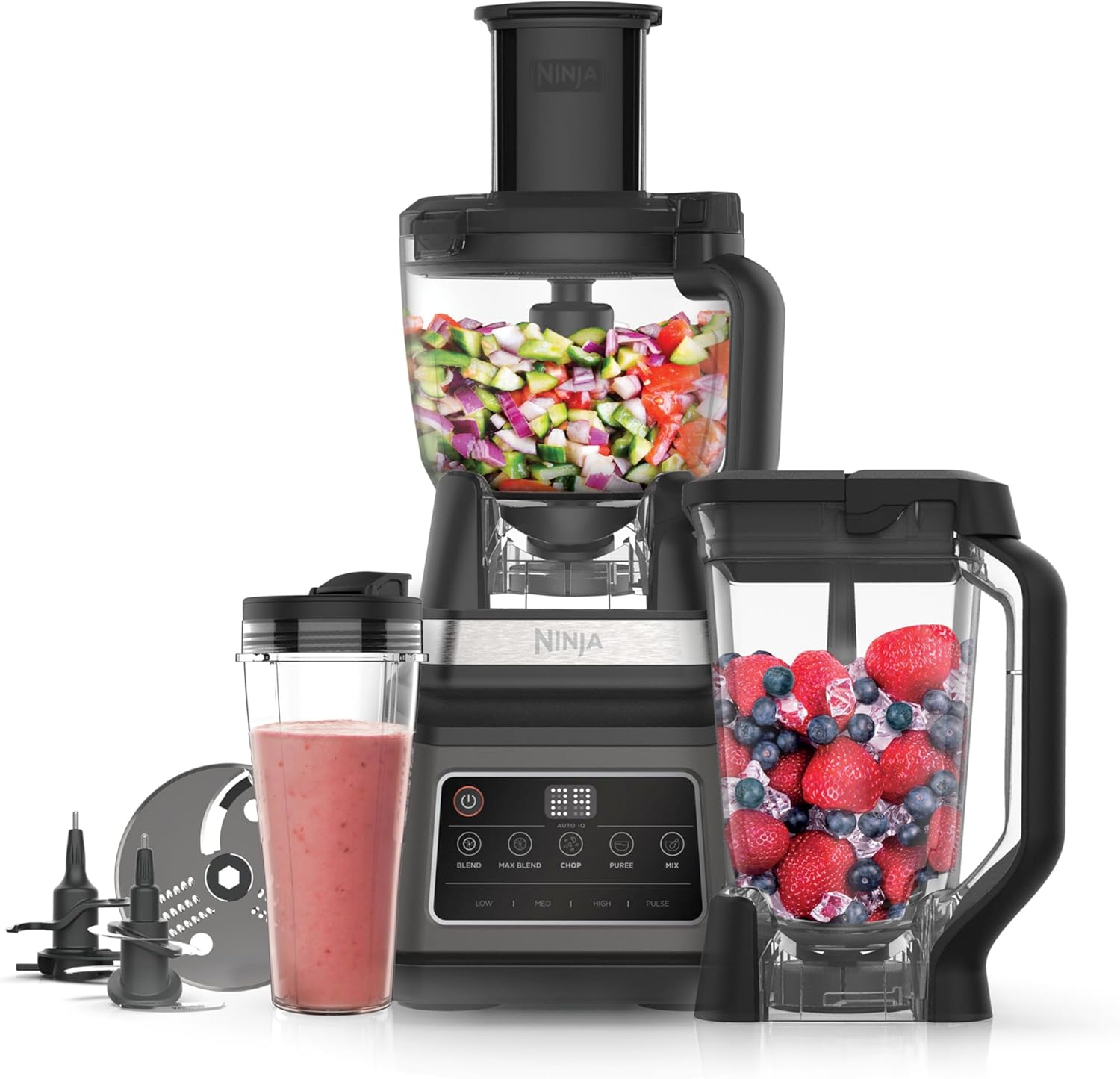A sleek black Ninja Blender 3-in-1 — it’s got style. The main unit flaunts buttons, all shiny and ready, while the 2.1-litre bowl sits there, waiting to tackle whatever you throw in. Perfect for whipping up smoothies or chopping veggies. It's not just a blender; it's an experience, right?