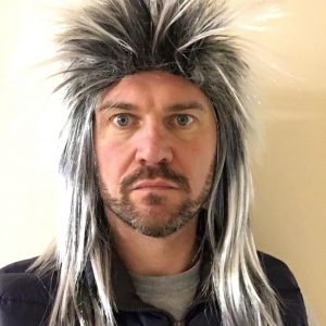 Men's Rod Stewart get-up—think glitzy sequined blazer, crisp white shirt, and those wild patterned trousers. Perfect for strutting your stuff at tribute gigs or just channeling that iconic vibe any time.