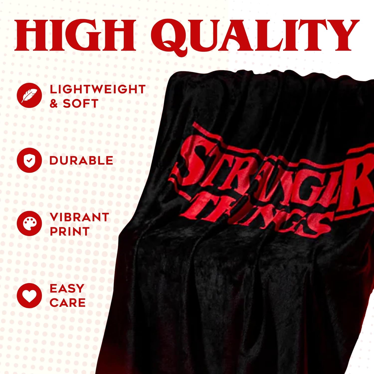 A soft red Stranger Things blanket sprawled over a couch—vivid colour popping against the fabric, plush and inviting. Perfect for binge-watching, or just a cozy night in.