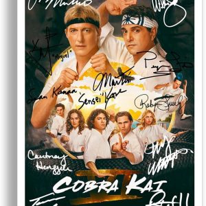 Cobra Kai Season 6 poster—bold colours pop right at you, the autographs, yeah, they're real too. Framed in sleek black, those bevel-edged mounts add a slick touch. Perfect for fans.