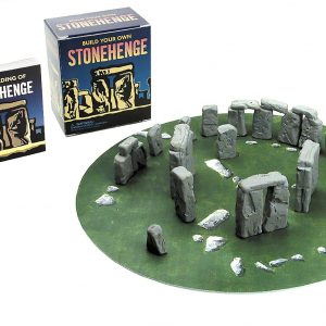 A tiny Stonehenge replica—crafted from real stone—proudly displays its rugged textures and earthy tones. All set against a stark white backdrop, it really pops, doesn’t it? Perfect for collectors or anyone who’s just a bit obsessed with history. Seriously, this little piece is a must-have!