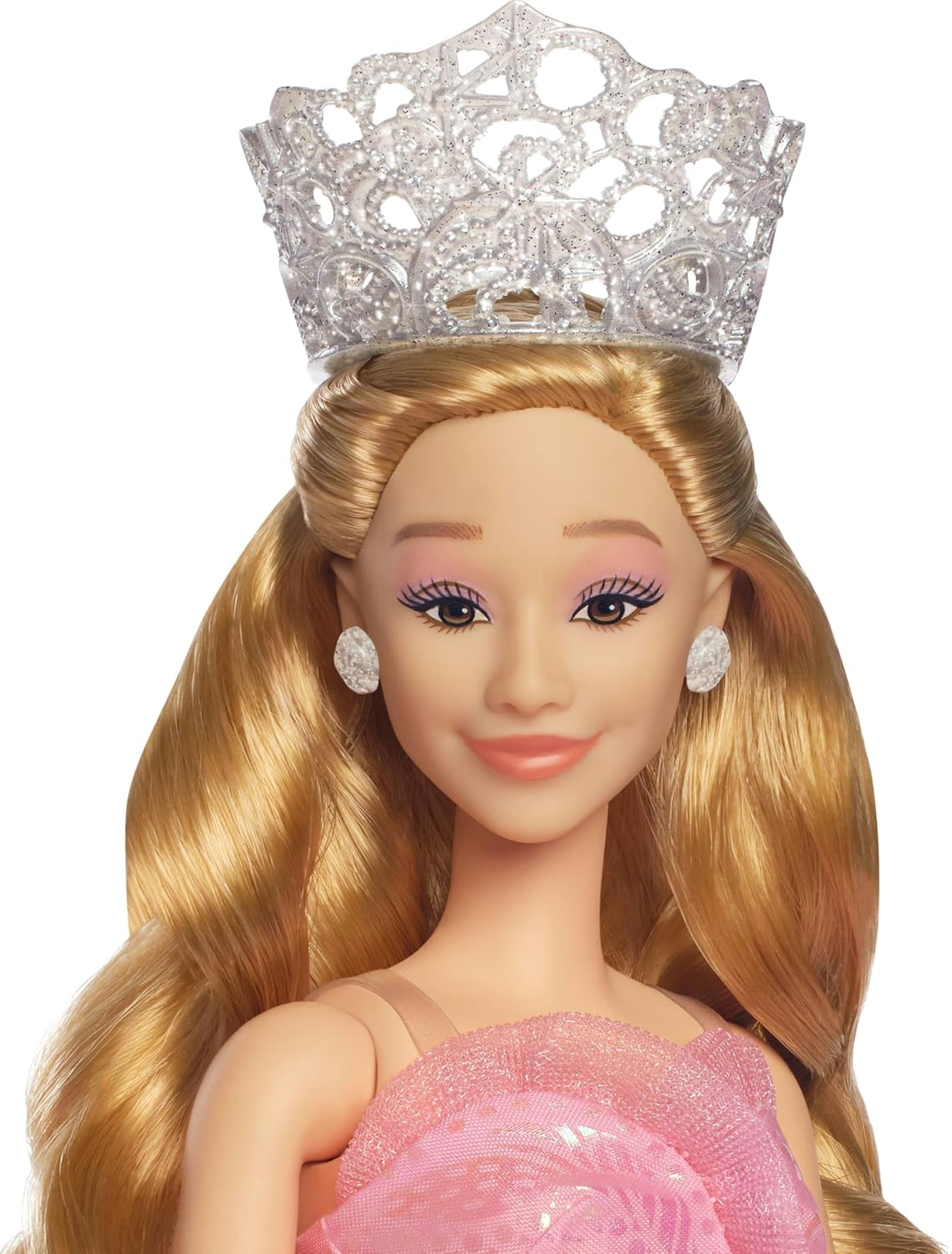Glinda Deluxe Doll, dressed in a stunning, poofy pink ballgown—what a sight! She's got her wand in one hand, tiara perched just right—perfect for any little dreamer. Set against a simple background, but boy, does she shine!