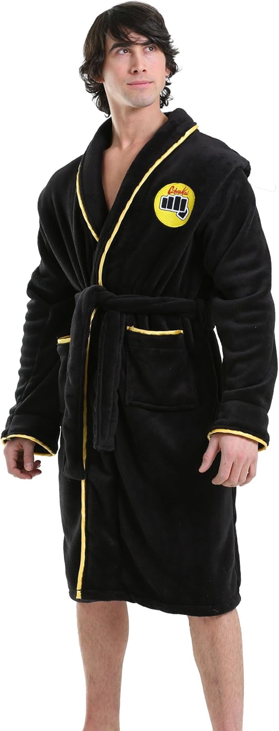 Wrap yourself in this black Cobra Kai dressing gown—it's got the logo front and centre on the back. The tie waist? Super handy for a snug fit. Perfect for lounging, or you know, plotting your next karate move.