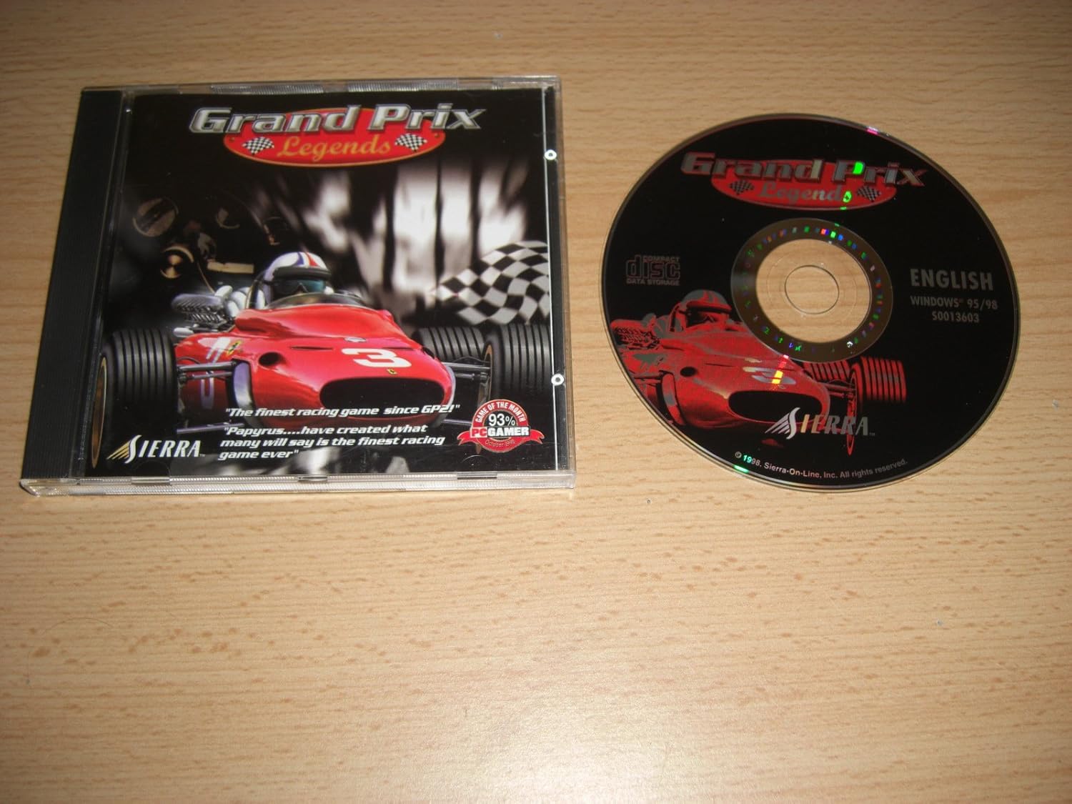 A snapshot from Grand Prix Legends—check out this classic open-wheel racer speeding through a historic track. The backdrop is lush and vibrant, really setting the scene. Just feels like you can almost hear the engines roar!