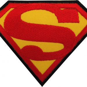 A bold red and yellow Superman badge featuring the iconic 'S' logo—set against a bright blue backdrop. It’s classic, it pops, and honestly, who doesn’t love a bit of superhero flair?