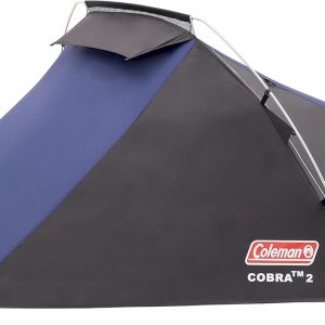 A Cobra 2 tent, decked out in black and blue, sprawled on lush green grass—look at that! Spacious inside, just one door for entry. Trees peek in from the background, adding a touch of wild. Perfect for those camping vibes, right?