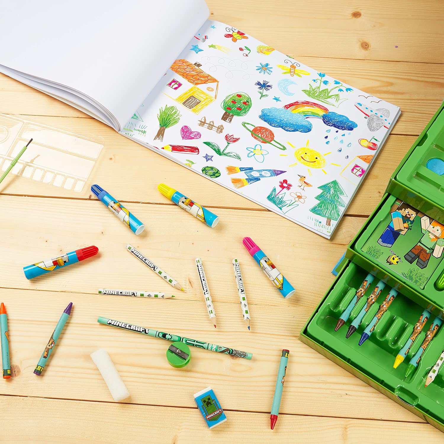 A portable 3-tier carry case bursting with Minecraft vibes—it's crammed full of art goodies: crayons, markers, funky watercolour paint disks, and a tiny colouring book. Perfect for anyone who can’t get enough of those pixelated adventures!