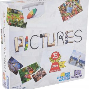 A lively box of the Pictures Game, bursting with vibrant multi-coloured pieces, sprawled out on a rustic wooden table. The bright hues jump out at you—perfect for family game night.
