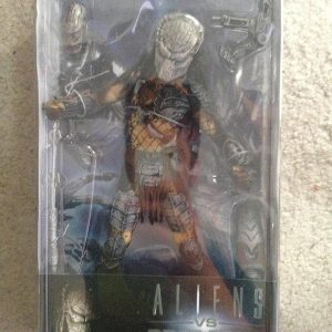 Action figure of the Masked Predator—striking a fierce pose, vibrant colours practically pop out. Check out those insane details! It's like they leapt straight out of a movie, ready for battle.